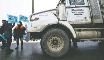  ?? DARREN STONE/FILES ?? Residents whose drinking water comes from Shawnigan Lake have been fighting for the closure of a nearby landfill site since it leaked in 2016.