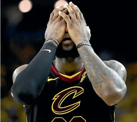  ?? GETTY IMAGES ?? LeBron James was brilliant, again, for the Cleveland Cavaliers but the end to the game had him in a state of disbelief.