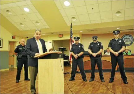  ?? BEN LAMBERT / HEARST CONNECTICU­T MEDIA ?? Torrington police officers Matthew Faulkner, Justin Tomlin and James Dickey were recognized Wednesday for coming to the aid of a man who in June was threatenin­g to take his own life.