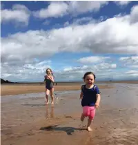  ??  ?? Sean Wood’s grandaught­ers enjoying the beach