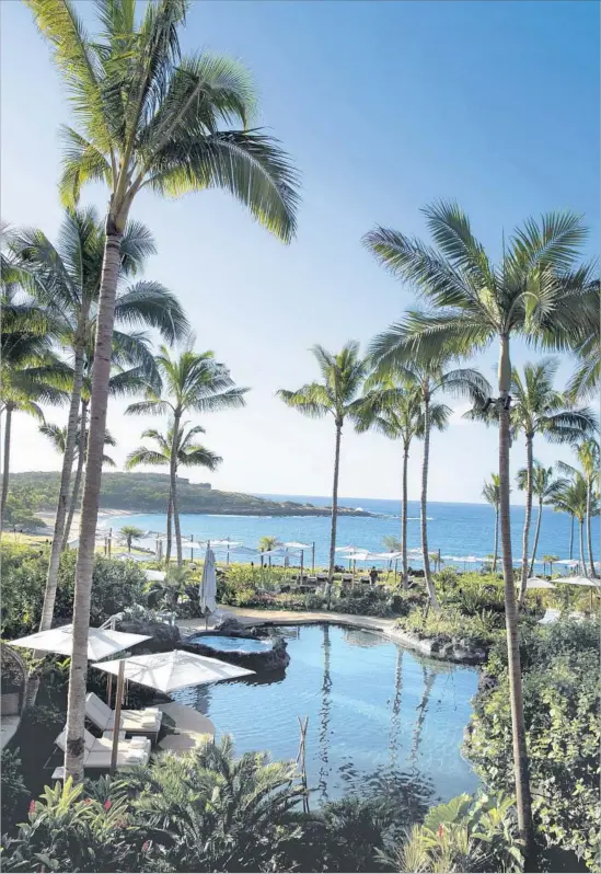  ?? Kent Nishimura Los Angeles Times ?? AFTER BILLIONAIR­E Larry Ellison bought most of Lanai in 2012, he revitalize­d the f lagship hotel, Four Seasons Resort Lanai, with a $450-million makeover.