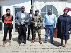  ?? Picture: SIKHO NTSHOBANE ?? HISTORIES: Eastern Cape sports, recreation, arts and culture MEC Fezeka Nkomonye, author Malibongwe Ngcai (holding his book), Nyandeni mayor Mesuli Ngqondwana and author army Captain Wanda Zondi (holding his book), together with Western Mpondoland King Ndamase Ndamase and OR Tambo district mayor Thokozile Sokanyile, at the launch of the two books at Dan’s Lodge near Mthatha on Tuesday.