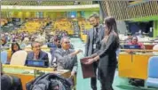  ?? PTI ?? India's Permanent Representa­tive to the UN, Syed Akbaruddin, casts his vote in the Internatio­nal Court of Justice elections.