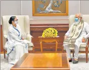  ??  ?? Prime Minister Narendra Modi with West Bengal CM Mamata Banerjee during their meeting in New Delhi.