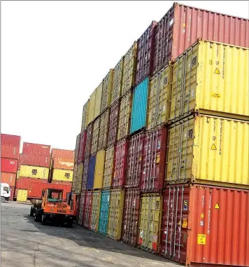  ?? PHOTO: SUNDAY AKINLOLU ?? Containers at Apapa Port…