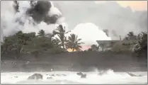  ?? PICTURE: REUTERS ?? Lava destroys a house as it flows into the Pacific Ocean in Hawaii’s Kapoho area during eruptions of the Kilauea volcano.