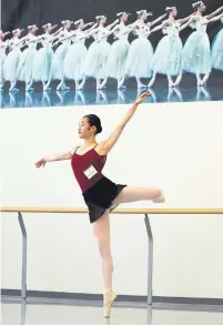  ??  ?? Minami Nihonyanag­i practises on the sidelines of the Genée Internatio­nal Ballet Competitio­n.