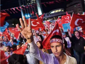  ?? — AFP ?? For the president: Erdogan supporters waving Turkish flags as they gather at Taksim square during a rally in Istanbul following the failed military coup attempt of July 15.