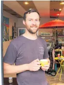  ??  ?? Third Wheel Coffee Company owner Tom Richardson says the business will succeed because locals want it to.