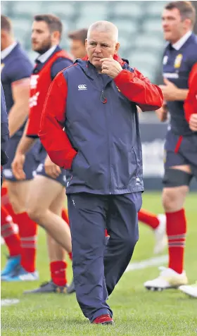  ??  ?? Watching brief: Warren Gatland keeps an eye on Lions training yesterday