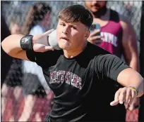  ?? SARAH GORDON/DAY FILE PHOTO ?? East Lyme High School’s Thomas Matlock, in a photo from an outdoor meet against Fitch on May 3, unloaded a personal best throw of 60 feet, 4.25 inches Saturday at the URI Indoor Track Classic to win by more than six feet. Matlock has the best throw in the state this winter.