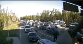  ?? NATIONAL PARK SERVICE VIA AP ?? This photo provided by National Park Service shows West Entrance gate traffic on Wednesday at Yellowston­e National Park in Montana.