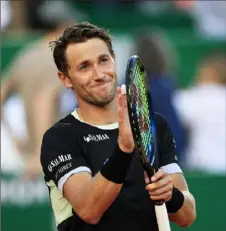  ?? Valery Hache/Getty Images ?? Casper Ruud applauds himself and the crowd after defeating Novak Djokovic Saturday in Monaco.