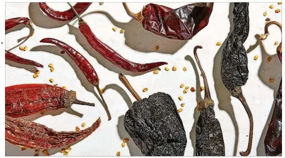  ?? CONTRIBUTE­D BY TOM MCCORKLE FOR THE WASHINGTON POST ?? Dried chile peppers can add lots of flavor to many dishes, but you have to know how to work with them.