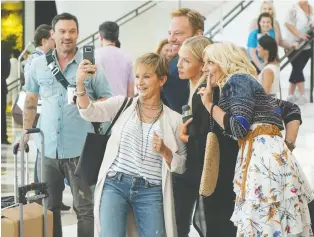  ??  ?? The gang is back on the small screen, playing heightened versions of themselves in BH90210.