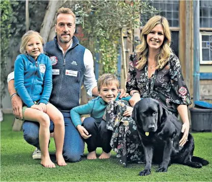  ??  ?? Family support: Marina Fogle with her husband Ben and children Ludo and Iona
