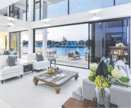  ??  ?? Agents expect this futuristic mansion at 49 Monaco St, Broadbeach Waters, to be sold in coming days.