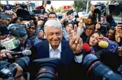  ?? GARY CORONADO / LOS ANGELES TIMES ?? Presidenti­al candidate Andrés Manuel López Obrador makes his way Sunday to a polling booth to cash his ballot in the Coyoacán section of Mexico City. He won the presidency decisively.