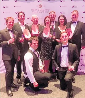  ?? Photo / Supplied ?? Top Left: Gianni Flego, Nick Picone, Sir George Fistonich, Helen Morrison, David Roper, Kathrin Jankowiec, David Field. Stuart Dudley, front left, and Abe Salt celebrate awards at the New Zealand Wine of the Year Awards.