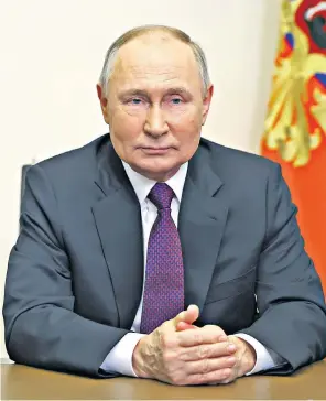  ?? ?? Vladimir Putin delivering a video address yesterday