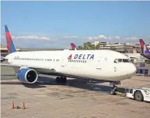  ??  ?? Delta is suspending its service between Newark and Amsterdam and between Philadelph­ia and London Heathrow.