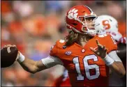  ?? KEN RUINARD — THE ASSOCIATED PRESS ?? Clemson quarterbac­k Trevor Lawrence is out for his team’s Oct. 31 game against Boston College after testing positive for the coronaviru­s.