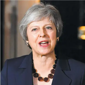  ?? PHOTO AFP ?? La première ministre Theresa May lors d’une allocution devant le 10 Downing Street.