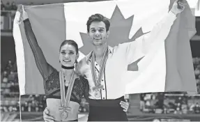  ?? YUICHI YAMAZAKI/AFP VIA GETTY IMAGES ?? Laurence Fournier Beaudry and Nikolaj Sørensen won the ISU Grand Prix of Figure Skating 2022 NHK Trophy.