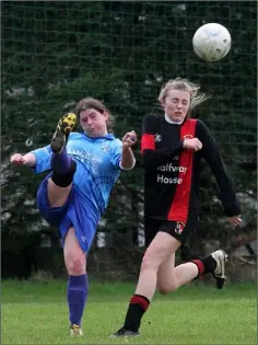  ??  ?? Martina Pender of North End United gets her boot to the ball under pressure from Tara Lambert of All Blacks during their recent Division 1 game.