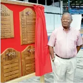  ?? AP ?? In this April 5, 2008, photo, former West Indies cricket player Everton Weekes stands in front of a display honouring Frank Worrell at the Queen’s Park Oval in Portof-Spain, Trinidad. —