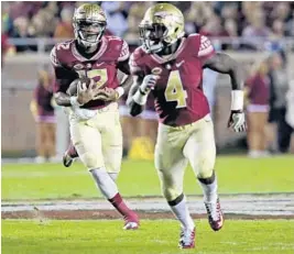  ?? AP FILE PHOTO ?? With FSU running back Dalvin Cook, right, likely heading to the NFL after his junior campaign, Deondre Francois, left, will be asked to lead the offense in 2017.
