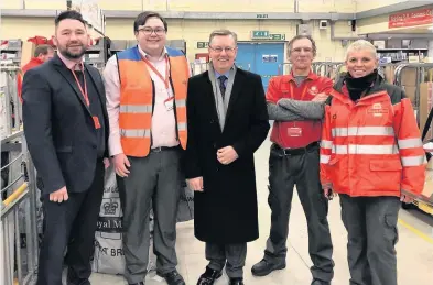  ??  ?? Visitor
Alexander Stewart MSP with (left) Post Office staff Malcolm Aien, Kyle Thornton, Alan Jack and Susie Harley