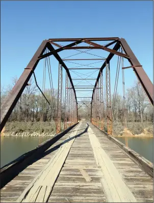  ?? The Sentinel-Record/Corbet Deary ?? OLD BRIDGE: Visitors to Nimrod/Lloyd Millwood WMA will have the opportunit­y to see a steel bridge that has spanned the Main Fourche LaFave River for many years.