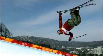  ??  ?? In this Feb. 19 file photo, Cassie Sharpe, of Canada, jumps during women’s halfpipe qualifying at the 2018 Winter Olympics in Pyeongchan­g, South Korea.AP Photo/GrEGory Bull