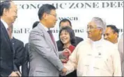  ?? AP ?? Myanmar’s commerce minister Than Myint (right) with Chinese ambassador Hong Liang in Naypyitaw.