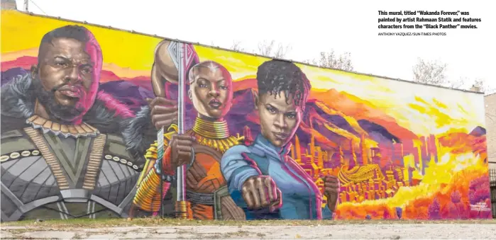  ?? ANTHONY VAZQUEZ/SUN-TIMES PHOTOS ?? This mural, titled “Wakanda Forever,” was painted by artist Rahmaan Statik and features characters from the “Black Panther” movies.