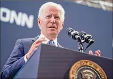  ?? Evan Vucci / Associated Press ?? President Joe Biden speaks at the dedication of the Dodd Center for Human Rights at the University of Connecticu­t Friday in Storrs, Conn.