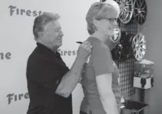  ?? KATHY RENWALD FOR THE TORONTO STAR ?? Aprile Patterson volunteers at Honda Indy Toronto and met Andretti.