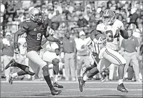  ?? AP/MARK HUMPHREY ?? Alabama running back Damien Harris (34) runs 61 yards for a touchdown ahead of Vanderbilt cornerback Joejuan Williams during the top-ranked Crimson Tide’s 59-0 victory over the Commodores on Saturday in Nashville, Tenn. Harris finished with 151 yards...