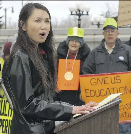  ?? LARRY WONG/FILE ?? Dr. Nhung Tran-Davies, here speaking to a 2014 parents’ rally at the legislatur­e, is a leading voice against the “discovery-based” math teaching she fears is hampering students’ learning.