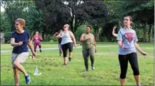  ?? DIGITAL FIRST MEDIA FILE PHOTO ?? People exercise outdoors during a Zumba fitness community event at Pottstown Memorial Park.