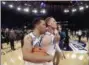  ?? FRANK FRANKLIN II — AP ?? Villanova’s Jalen Brunson, left, celebrates with Donte DiVincenzo after beating Providence in the Big East tournament final March 10.