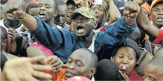  ?? / SIMON MAINA/ AFP ?? Supporters of Kenya's opposition leader Raila Odinga shout slogans at a rally in Nairobi on Wednesday.