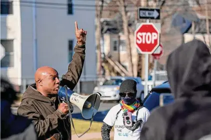  ?? Patrick Sikes / For Hearst Connecticu­t Media ?? Above and below, protesters rally in Hartford on Saturday, the day after authoritie­s in Memphis, Tenn., released video showing the police beating of Tyre Nichols following a traffic stop on Jan. 7. Nichols, a Fed-Ex worker and father to a 4-year-old son, died days later in the hospital. The five Memphis Police Department officers involved in the assault, including Bloomfield High School graduate Desmond Mills Jr., have been fired and charged with murder.