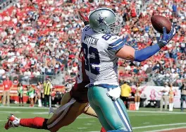  ?? AP Photo/
Marcio Jose Sanchez, File ?? ■ Dallas Cowboys tight end Jason Witten (82) catches a touchdown Oct. 22, 2017, in front of San Francisco 49ers strong safety Jaquiski Tartt during the first half of a game in Santa Clara, Calif. A person with direct knowledge of the decision says...