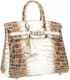  ??  ?? Above: Hermès Himalayan Nilo crocodile Birkin is estimated to sell for $60,000-$80,000