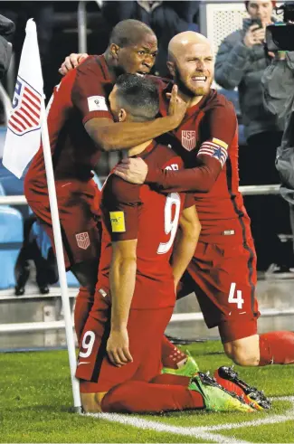  ?? JIM GENSHEIMER/STAFF ?? South San Francisco product Sebastian Lletget (9) celebrates with teammates after scoring on Honduras.