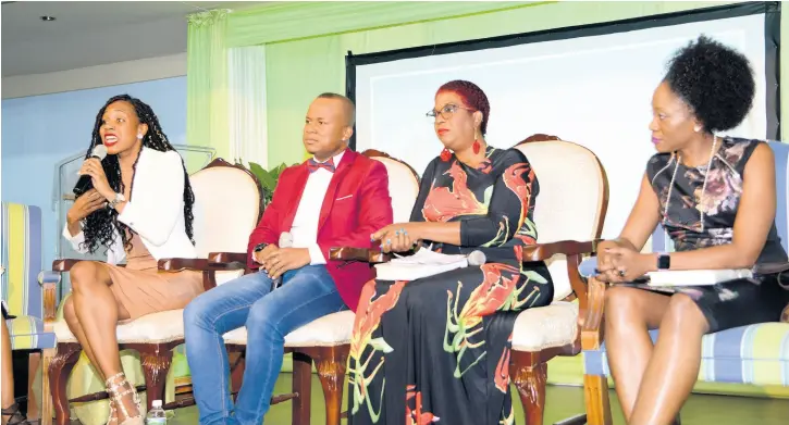  ??  ?? Terri-Karelle Reid, George Davis, Sandra Samuels and Nadeen Mathews-Blair passionate­ly discuss the art of becoming.