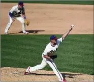  ?? DERIK HAMILTON — THE ASSOCIATED PRESS ?? Philadelph­ia Phillies starting pitcher Matt Moore throws during the fourth inning of the first baseball game of the team’s doublehead­er against the Miami Marlins Friday in Philadelph­ia.