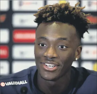  ?? PICTURE: NICK POTTS/PA WIRE ?? ALL SMILES: Tammy Abraham pictured during the media day at St George’s Park, Burton, yesterday ahead of England’s matches with Germany and Brazil. The Chelsea player, on loan at Swansea, is a part of England’s senior set-up for the first time.